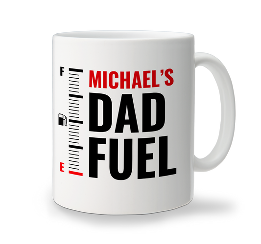 A white father's day mug with the text funny text 'MICHAEL'S Dad Fuel' printed on it, designed in a vertical orientation.