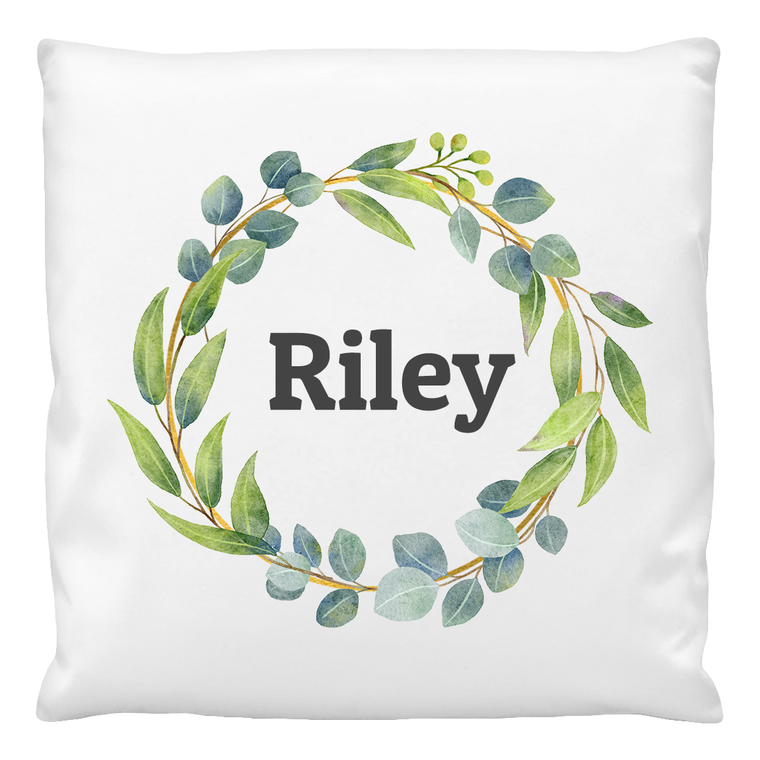 A white cushion cover with the name 'Riley' printed in the center, surrounded by a leafy wreath design.