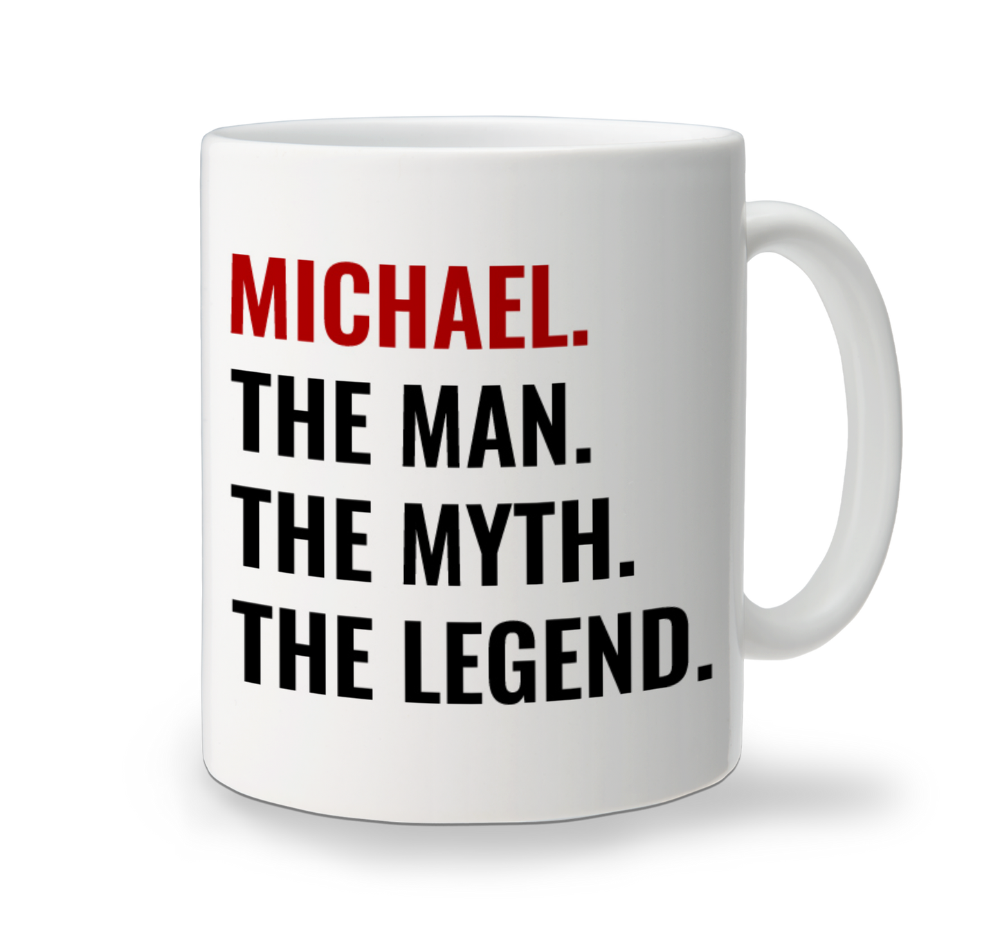 A white Fathers' Day ceramic mug with text 'MICHAEL. THE MAN. THE MYTH. THE LEGEND.' printed on it.