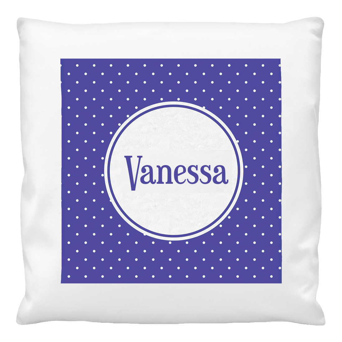 A blue cushion cover with white polka dots and a personalized name 'Vanessa' printed in the center.