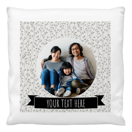 A custom cushion cover featuring a family photo with a space for personal text, on a white background with a patterned design.